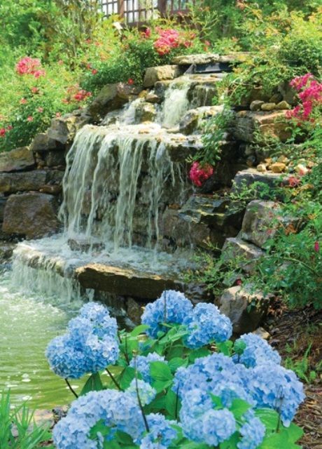 WAterfall like this without the pond would work well in our back .