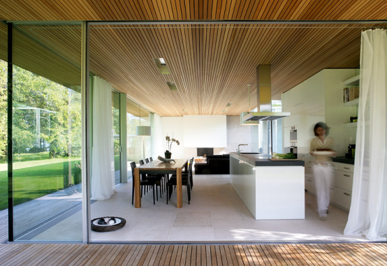 A Bungalow Made Of Wood And Glass | Bungalow design, Modern .
