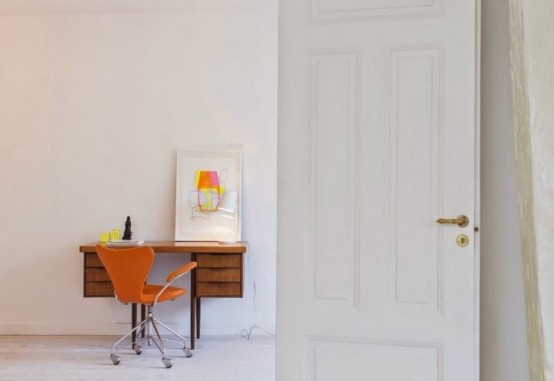 Minimalist Stockholm Apartment Designed With Bright Orange Accents .