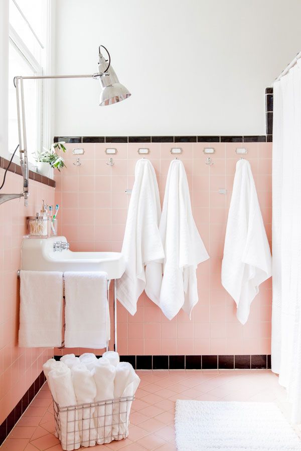 Vintage vibes in the bathroom with pink and black tiles. | Pink .