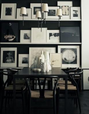 black and white dining room with portraits. | Black and white .