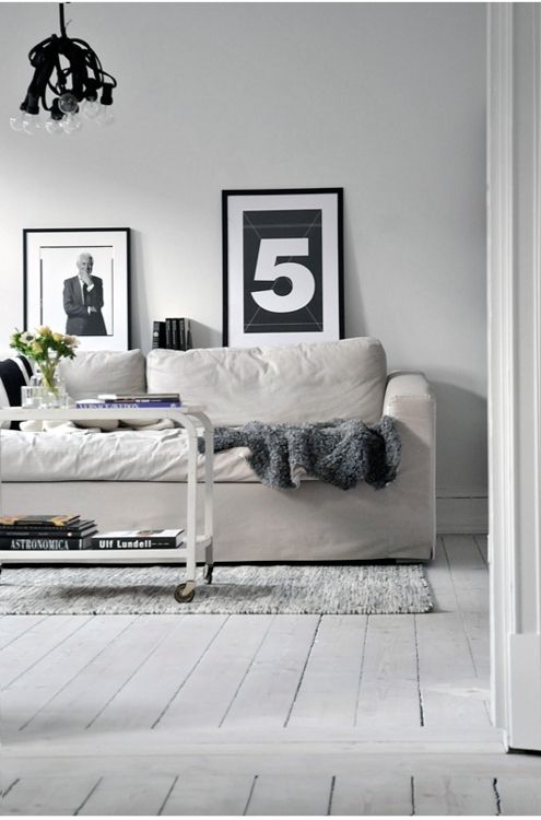 via Calm And Casual House Designed In White And Light Grey Colors .