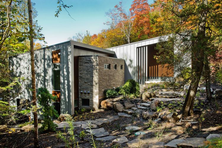 Eramosa limestone facade of Quebec retreat | Modern cottage, Lake .