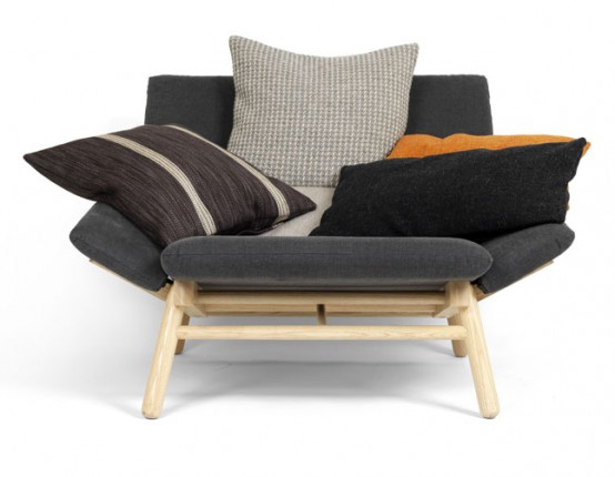 Comfortable And Inviting Sofa With Pillows by Kallemo