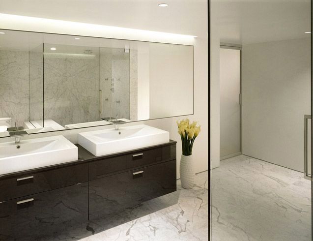 Minimalist bathroom with marble tiles flooring | White marble .