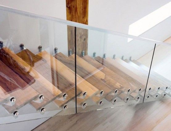 Contemporary Loft Design With An Artistic Interior Staircase