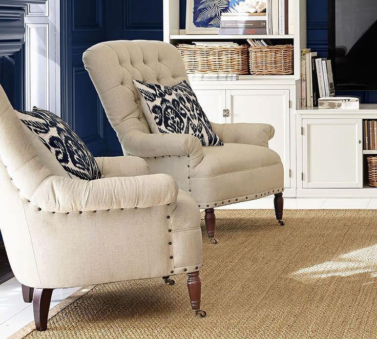 Create your own cozy corner with a classic upholstered armchair .