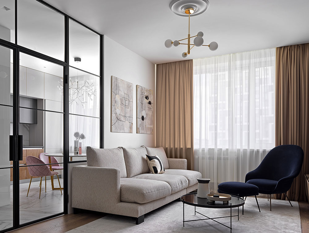 Modern apartment in smooth soft tones fora young couple in Moscow .