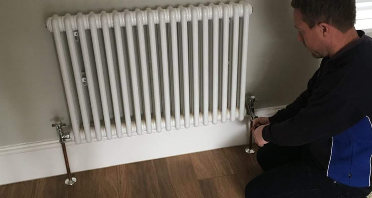 How much does removing and replacing a radiator cos