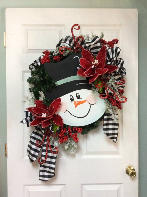Decorate your home with this fun Snowman Christmas door wreath. I .