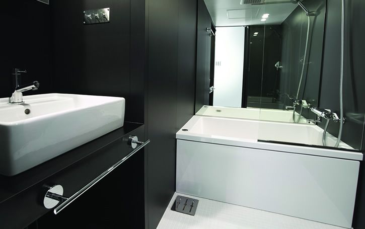 Functional and Compact Bathroom Solution for Small Apartment .