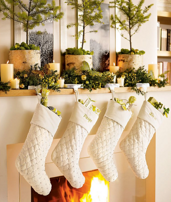 White #Christmas mantel with stockings via Pottery Barn .