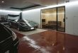 House with 9-Cars Garage and Lamborghini in the Living Room - DigsDi