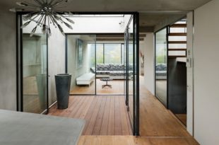 Japanese Townhouse With an Outdoor Deck On The Roof and a Two .