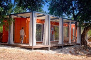 Rusty Shipping Container Transformed into a Glamorous Guest Hou
