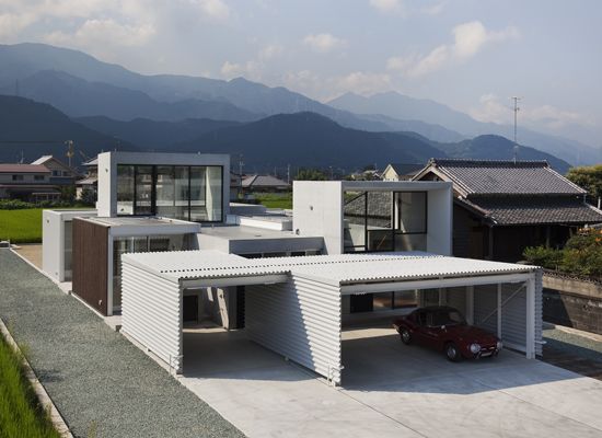 minimalist house design that consist of small rectangular blocks .