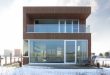 Minimalist House With Strict Geometric Shapes - DigsDi