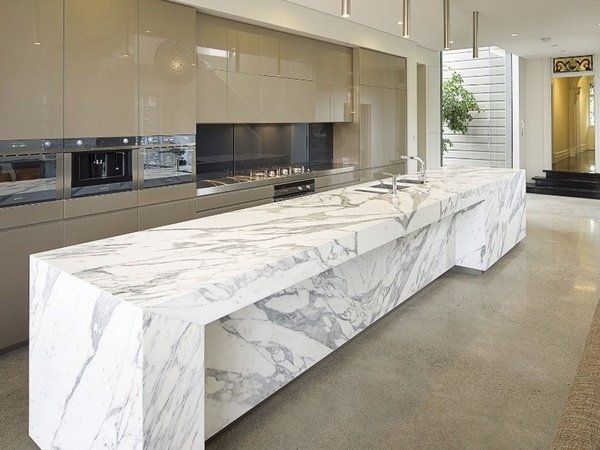 Amazing kitchen designs with Calacatta marble kitchen countertops .