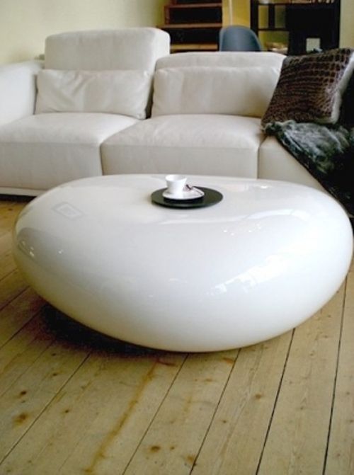 Modern And Functional Philosophical Table And Pouf In One .