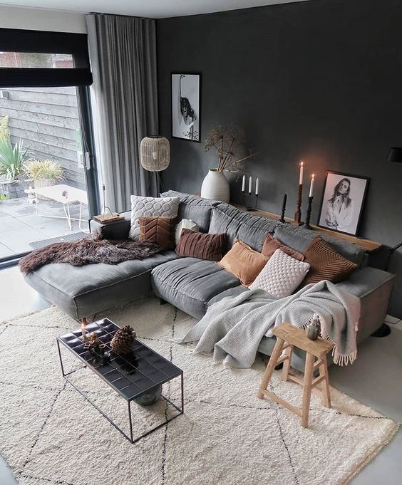 Modern living room, Scandinavian design, grey couch, grey wall .
