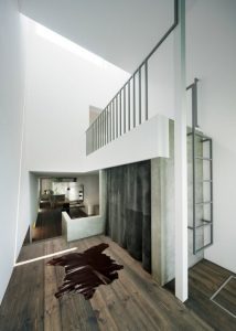 Narrow Urban Home With Industrial Minimalist Interiors - DigsDi