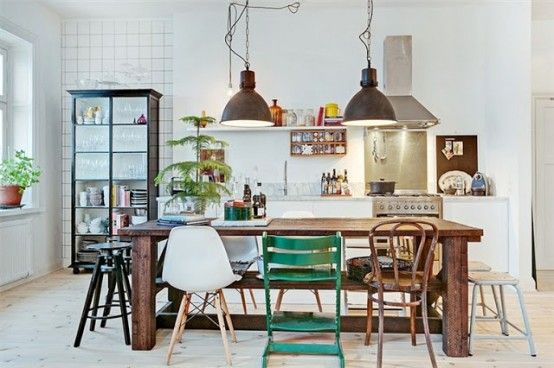 Old Meets New In Stockholm Apartment Design | Mixed dining chairs .
