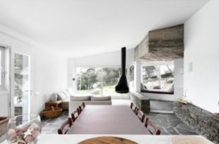 Rustic House With Massive Rock Formations In The Interior - DigsDi