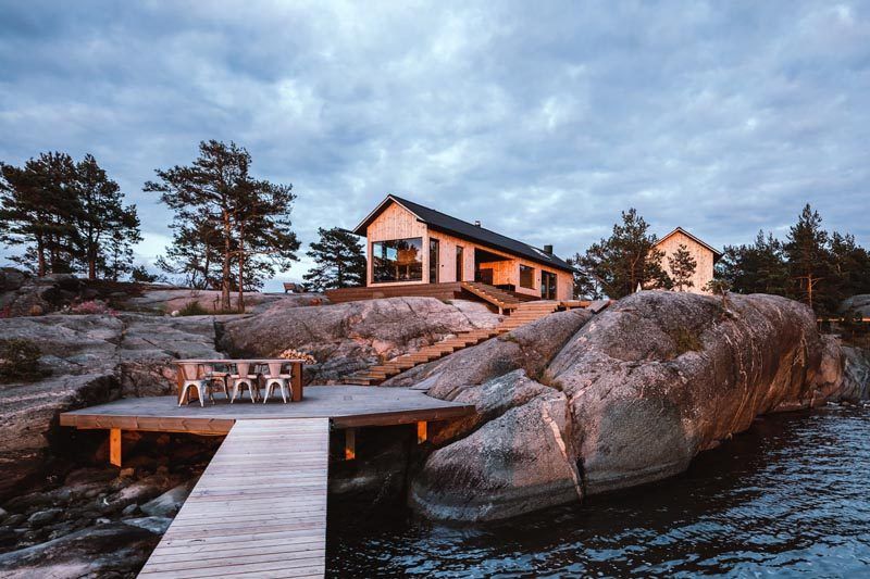 This Pair Of Contemporary Cabins Sit On An Island In The Finnish .