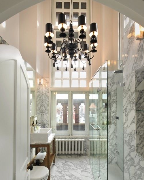 Bathroom example for a contemporary design idea with large marble .