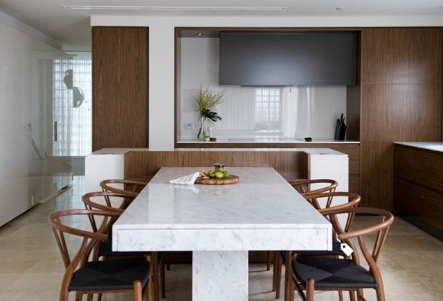 The marble dining table adds a stylish and modern touch to your .