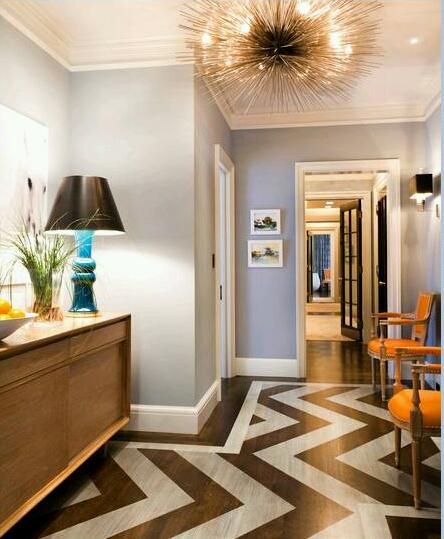 Chic, eclectic foyer with sea urchin pendant chandelier, coffee .