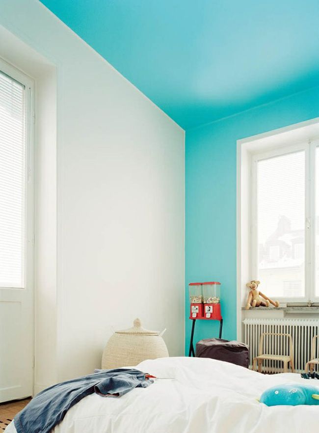 Another color block idea for the bedroom-- deep teal behind bed .