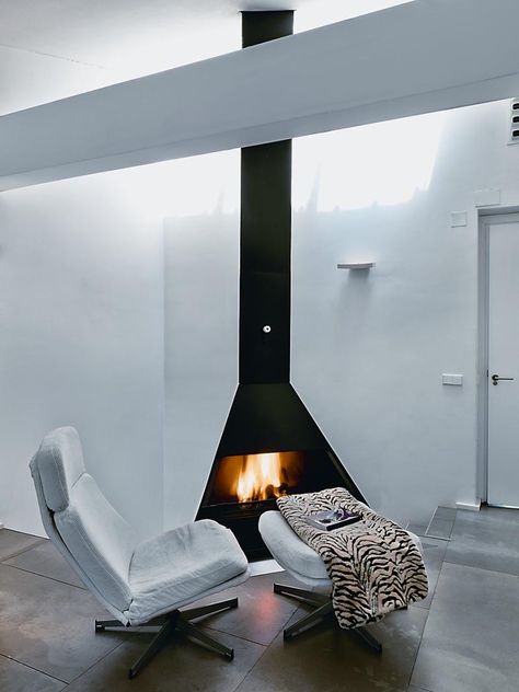 This fireplace lets the excess smoke out via the roof, also looks .