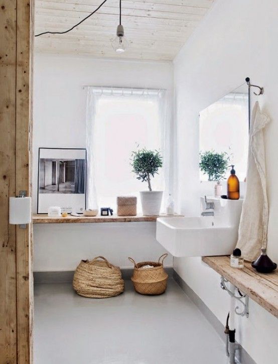 White Scandinavian Apartment With Natural Wood Accents | DigsDigs .
