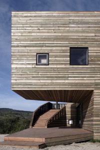 Wooden Fortress-Like Metamorphosis House In Chile - DigsDi