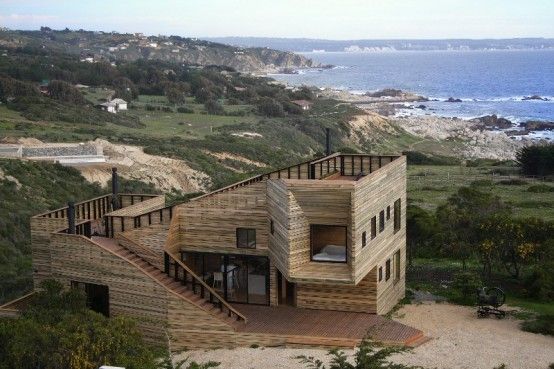 Wooden Fortress-Like Metamorphosis House In Chile | DigsDigs .